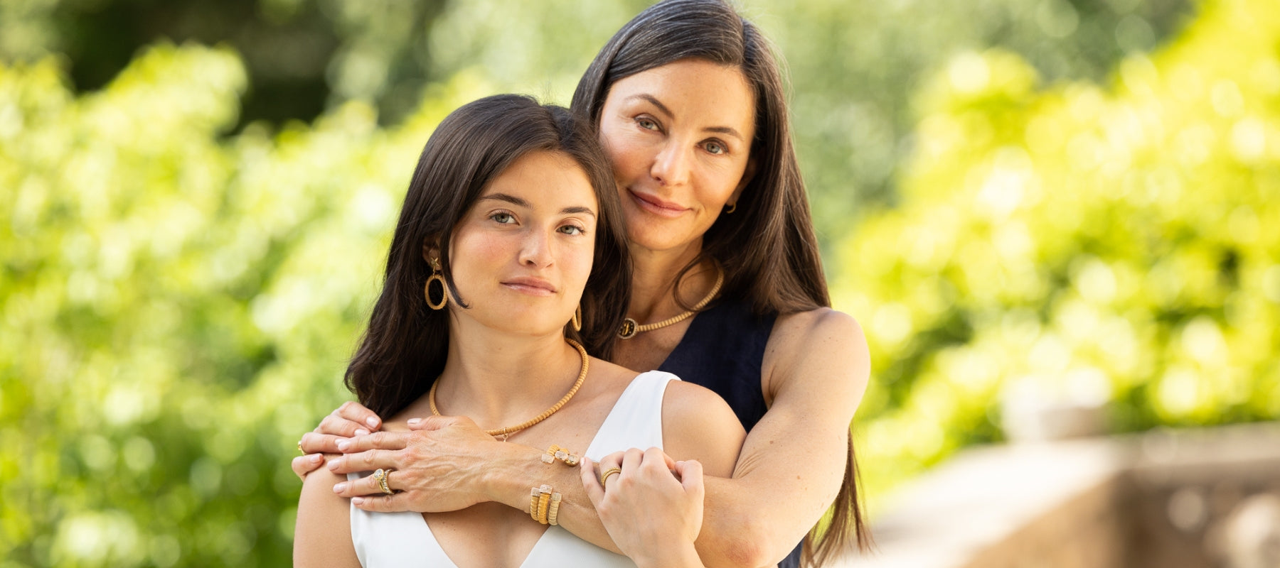 Owner of Paris & Lily huggin daughter; both wearing P&L jewelry