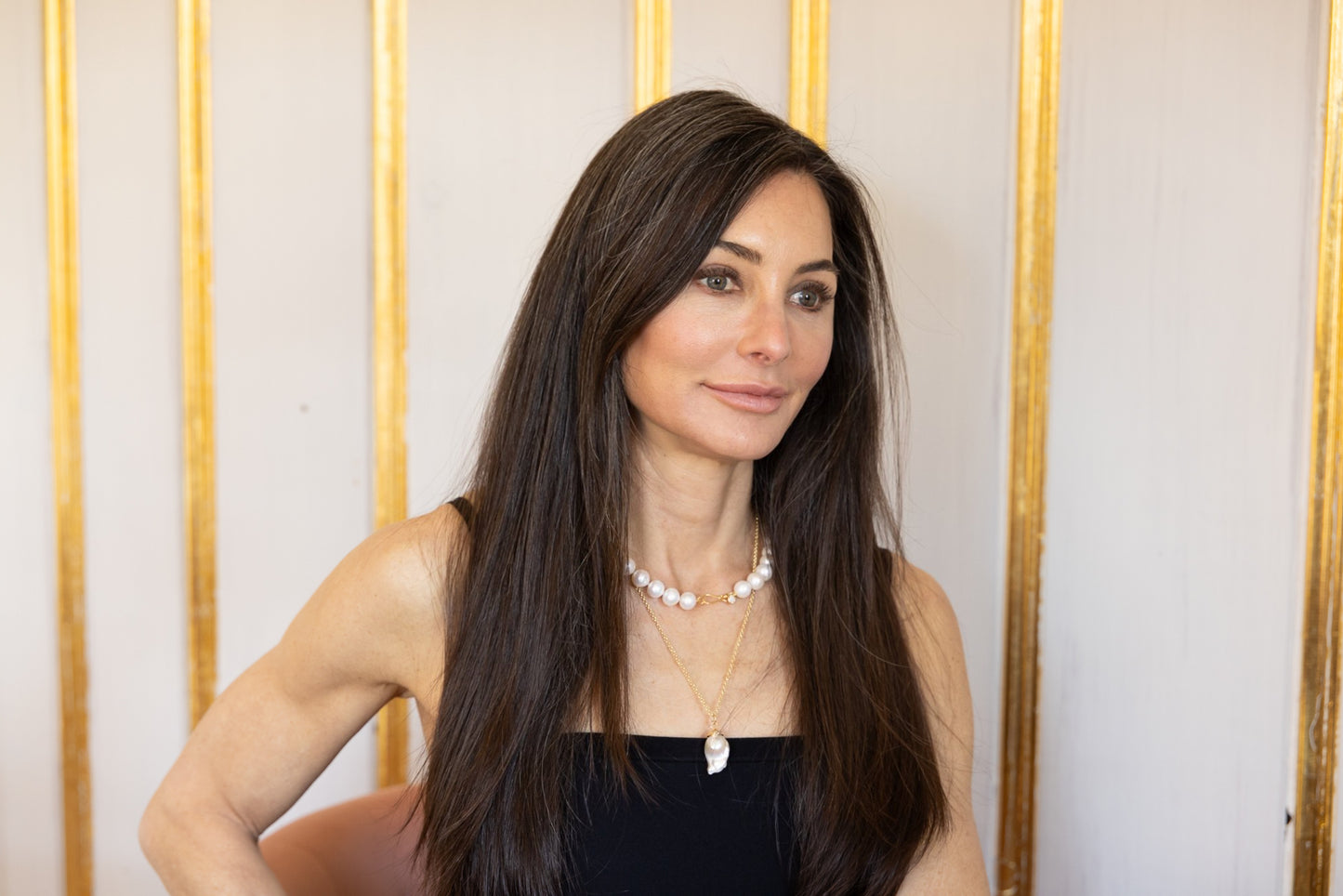freshwater pearl necklace with gold clasp on model