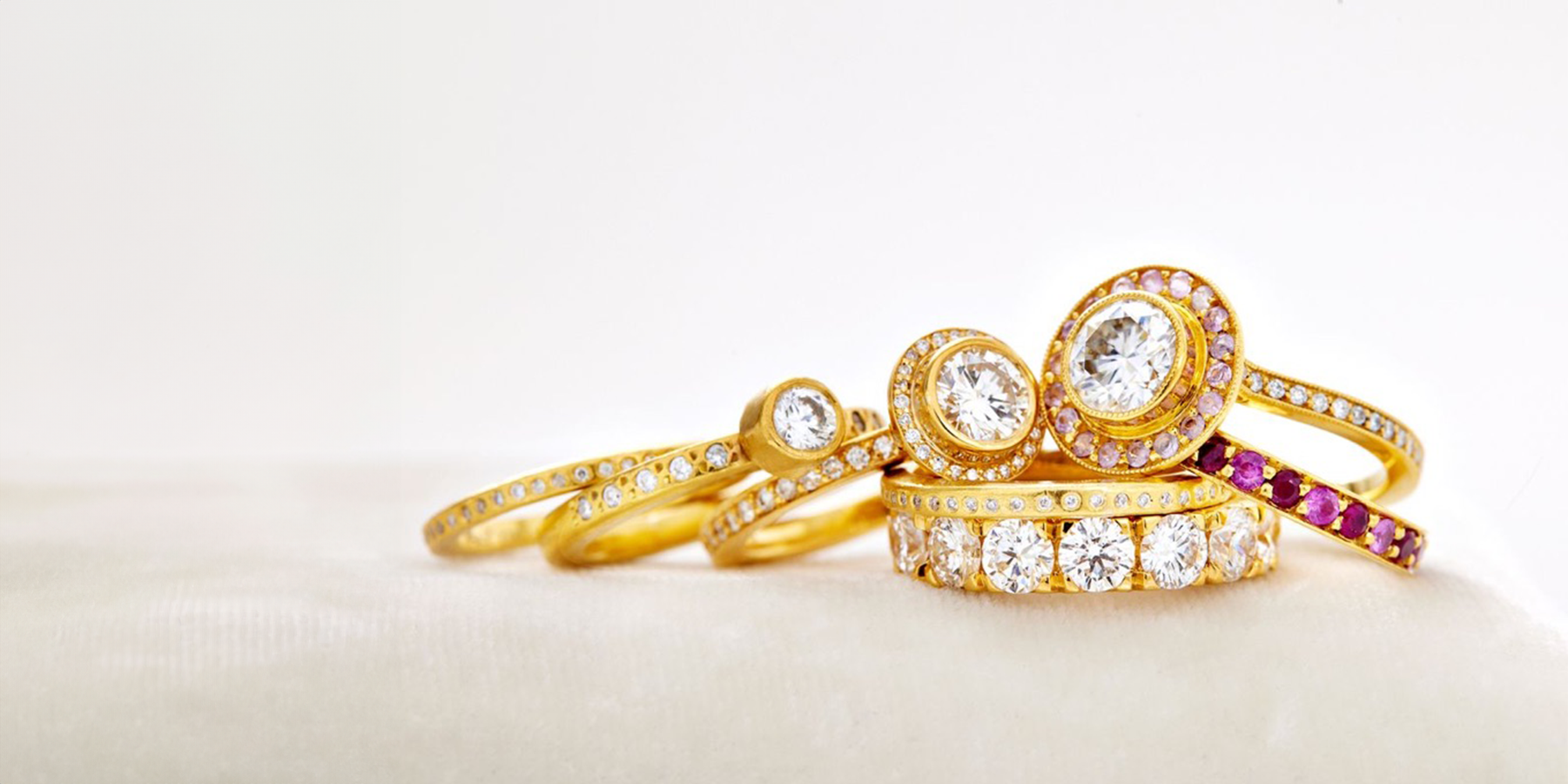 Gold rings with pink gemstones