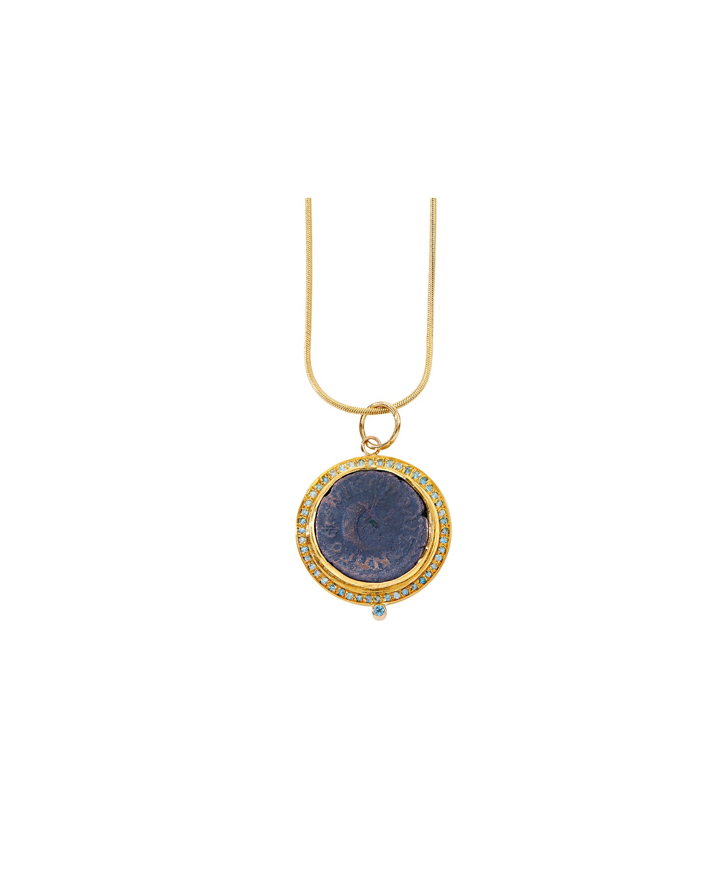 22K gold pendant with a Roman coin depicting a crescent moon and six pointed star dazzles with bright blue zircons
