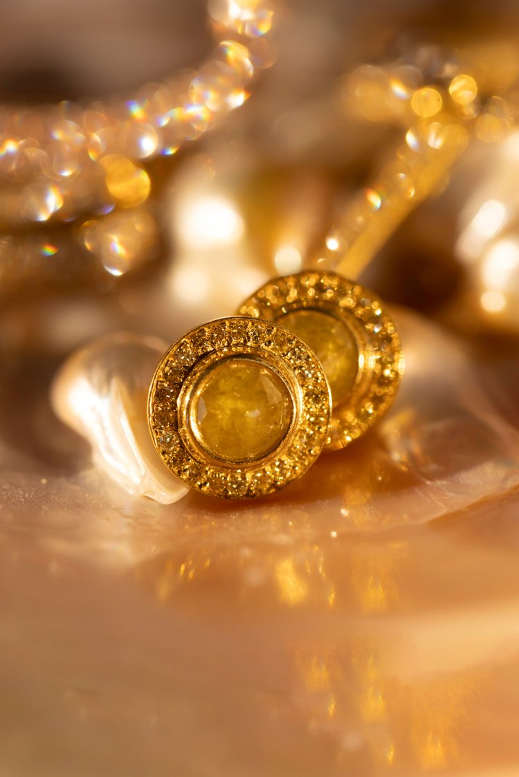 Large Yellow Diamond Studs with gold background