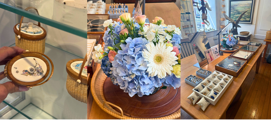 oman holding nantucket baskets, flower bouquet and tray of jewelry