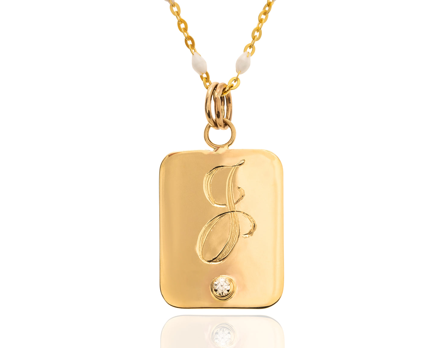 Pendant engraved with the letter J