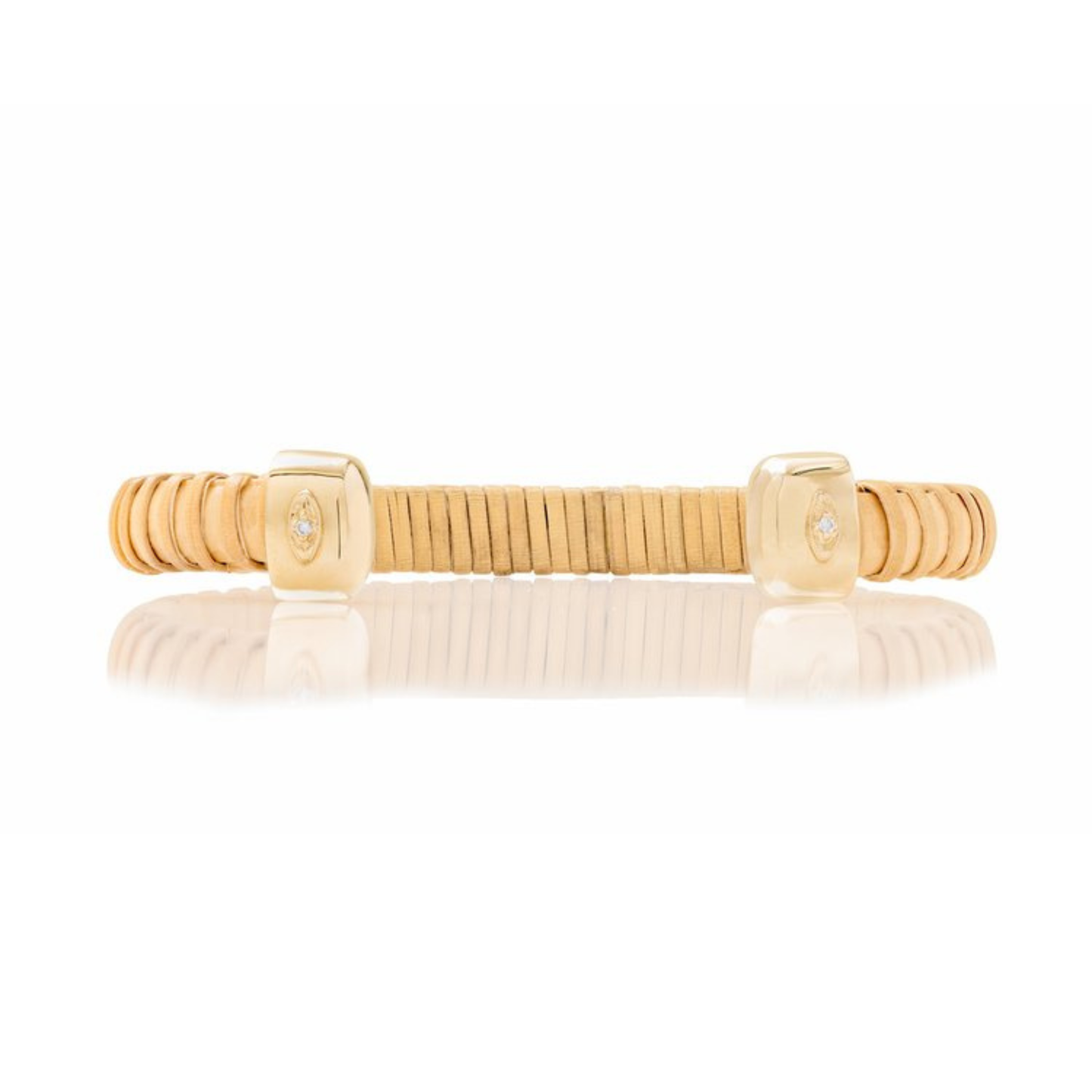 natural rattan woven cuff with gold caps and single diamond