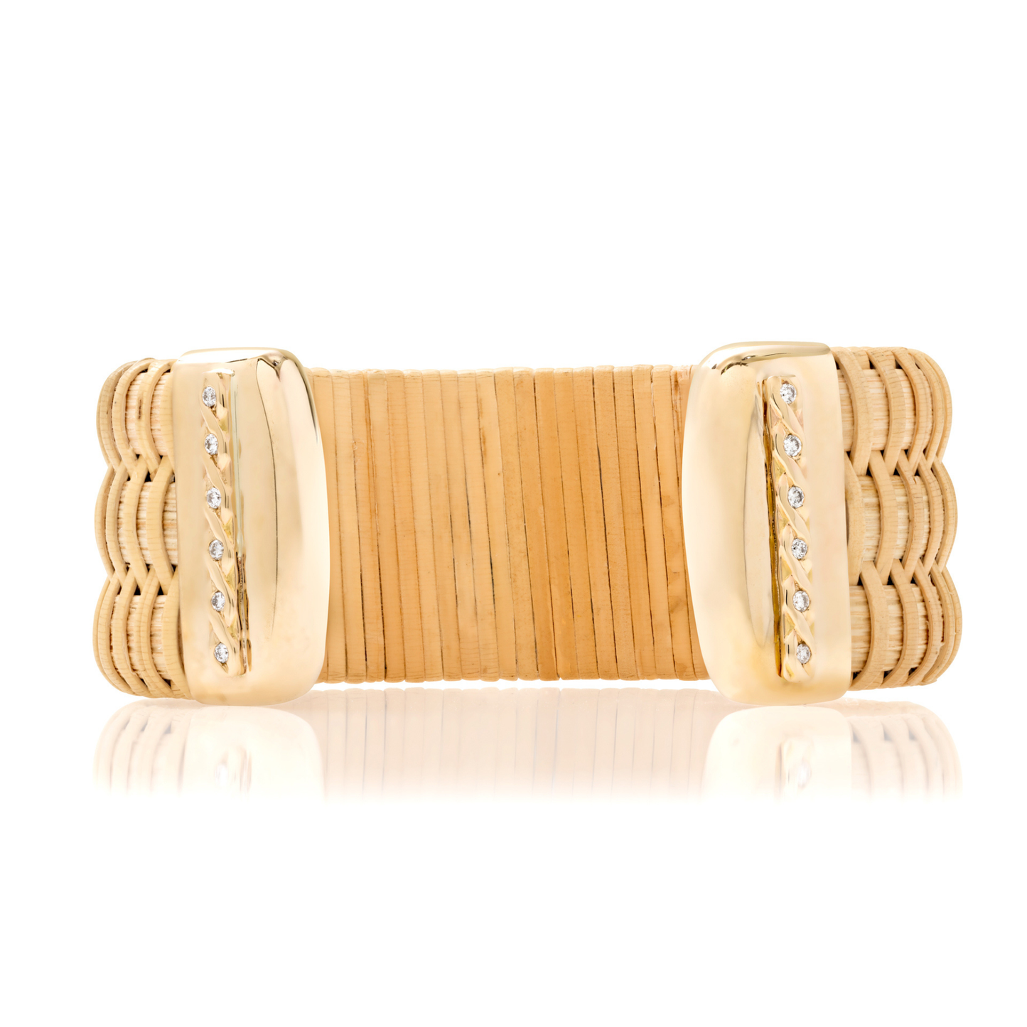 wide woven cuff side view with gold caps and diamond accents