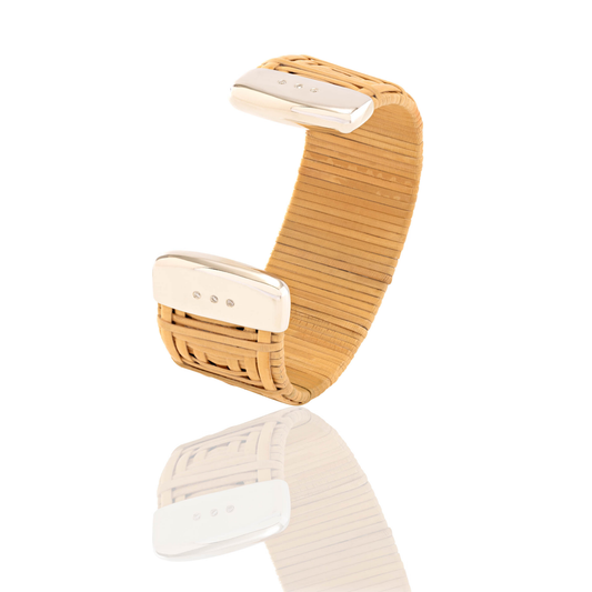 Nantucket Basket Lightship cuff, handwoven from natural cane and rattan, with sterling silver caps and six brilliant-cut diamonds.