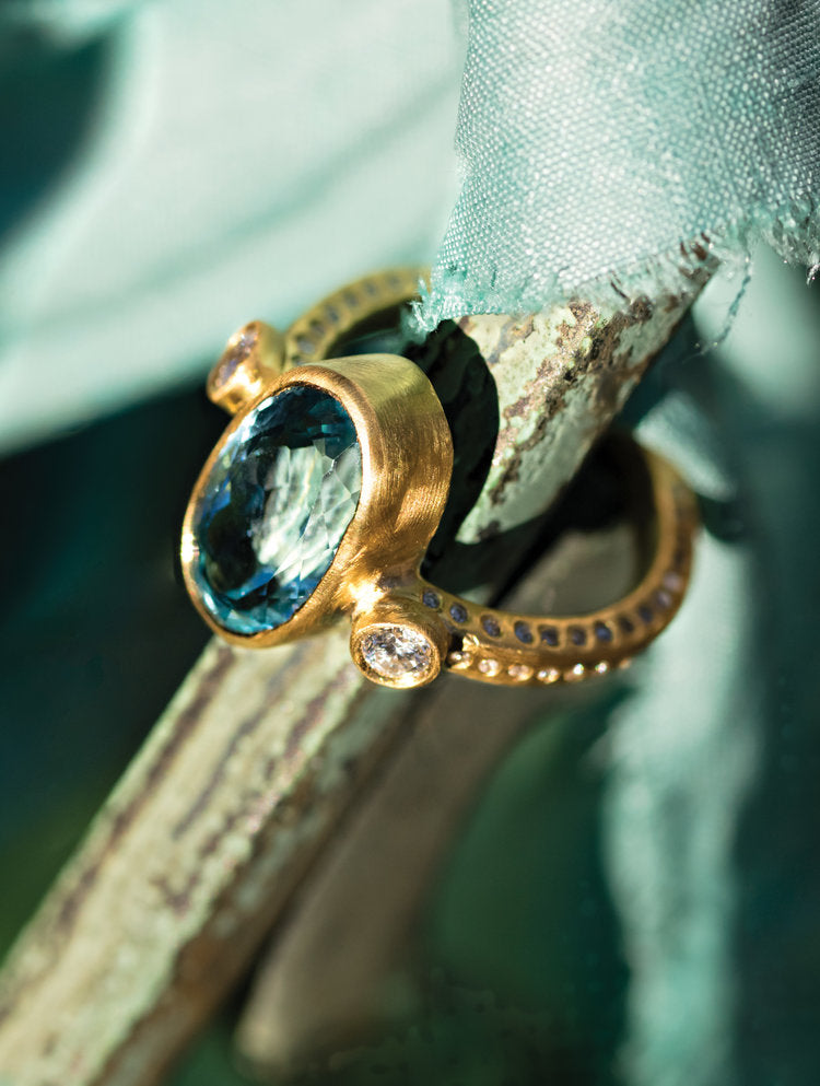 Gold & Aquamarine Ring on stick