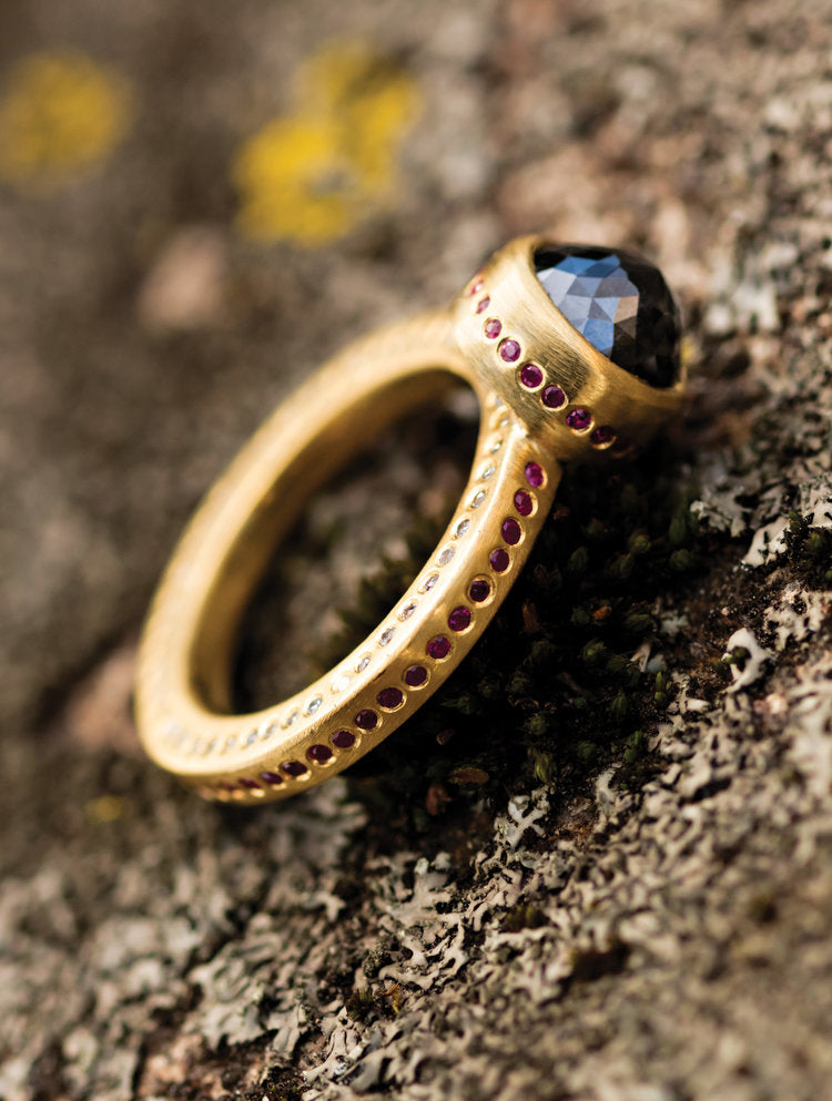 Gold & Black Diamond Ring on stone