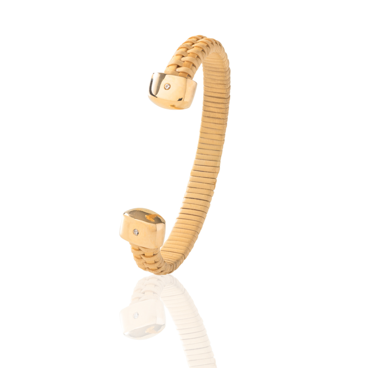 Basket weave cuff with cold caps and single diamond