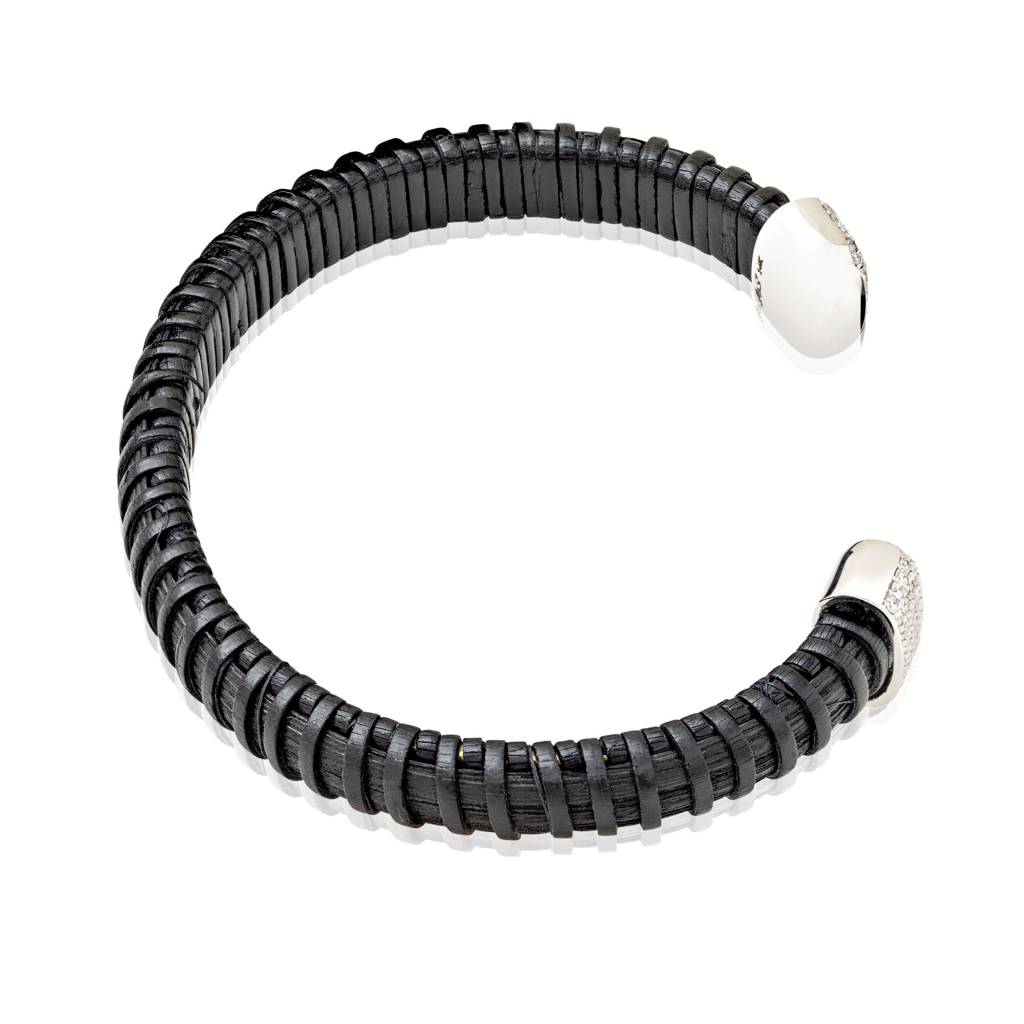 Black woven bracelet with silver caps and diamonds on a blank background