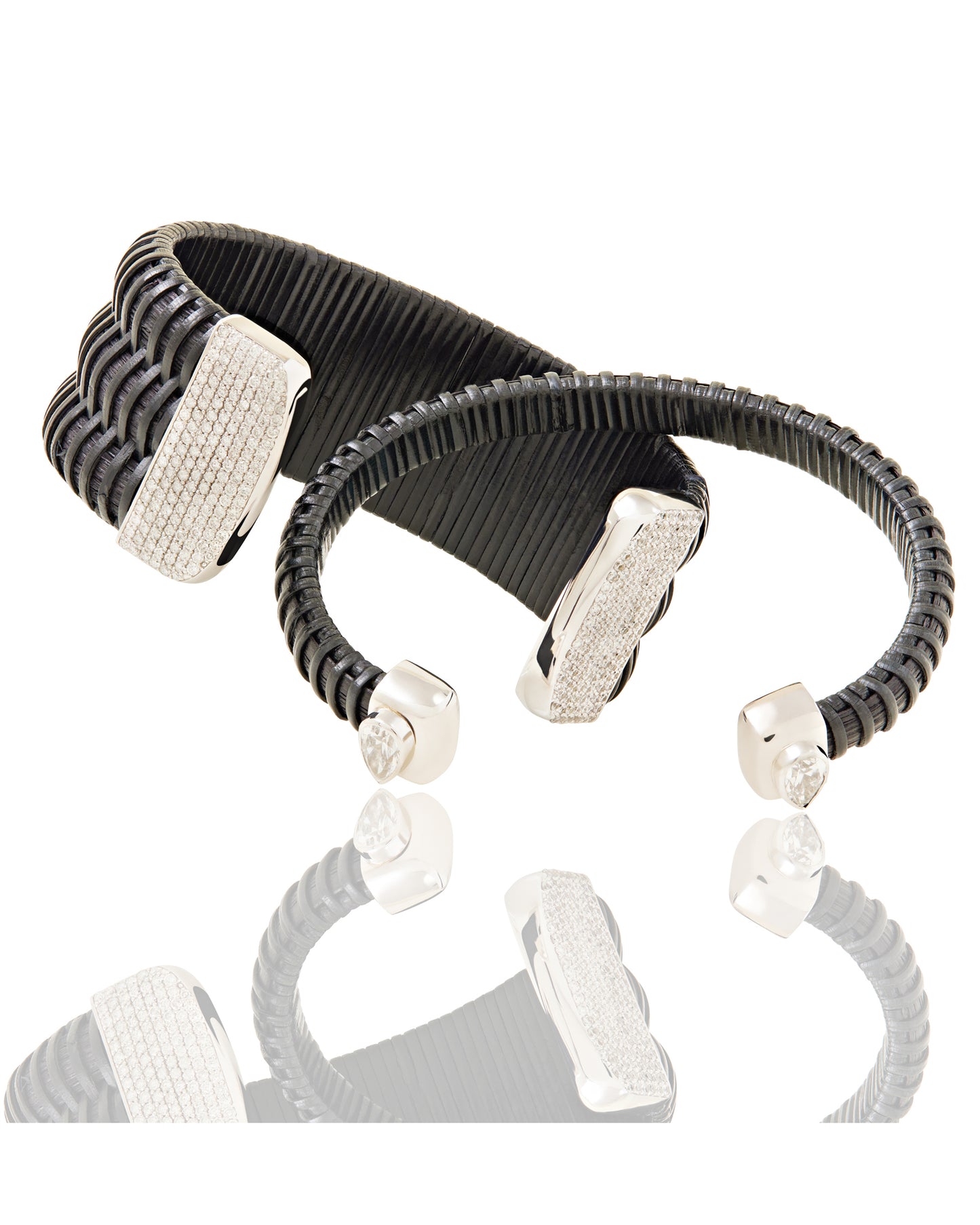 Two versions of midnight swim nantucket cuff bracelets in black; 1 inch and .25 inch