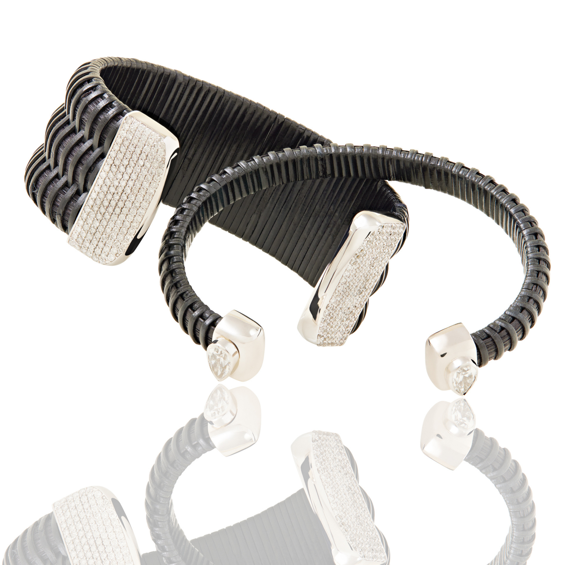Two versions of midnight swim nantucket cuff bracelets in black; 1 inch and .25 inch