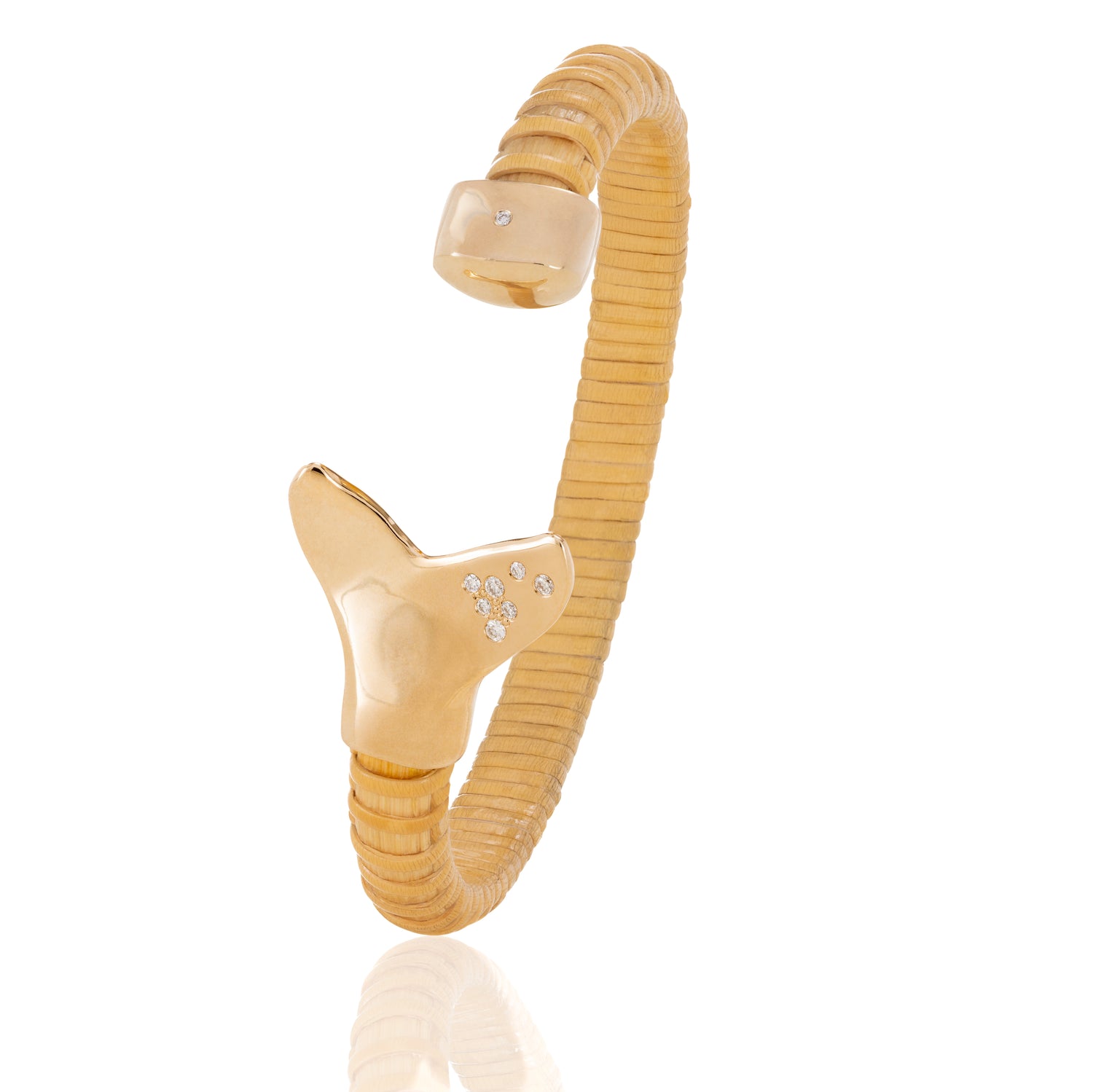 Nantucket Basket bracelet with gold caps; one shaped as whale tail and one as regular cap, both with diamonds.