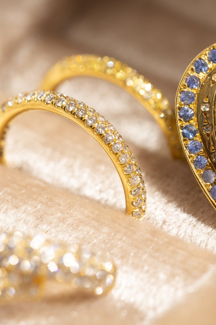 Pave Diamond Band in box with other rings