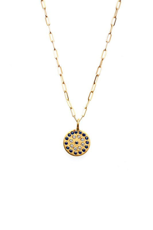  round evil eye style this piece will quickly become a favorite. &nbsp;Sparkling diamonds and deep blue sapphires are so luxurious with 22K yellow gold. &nbsp;